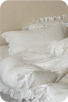 White ruffled bedding