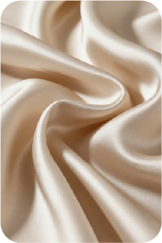 Close-up of cream silk fabric